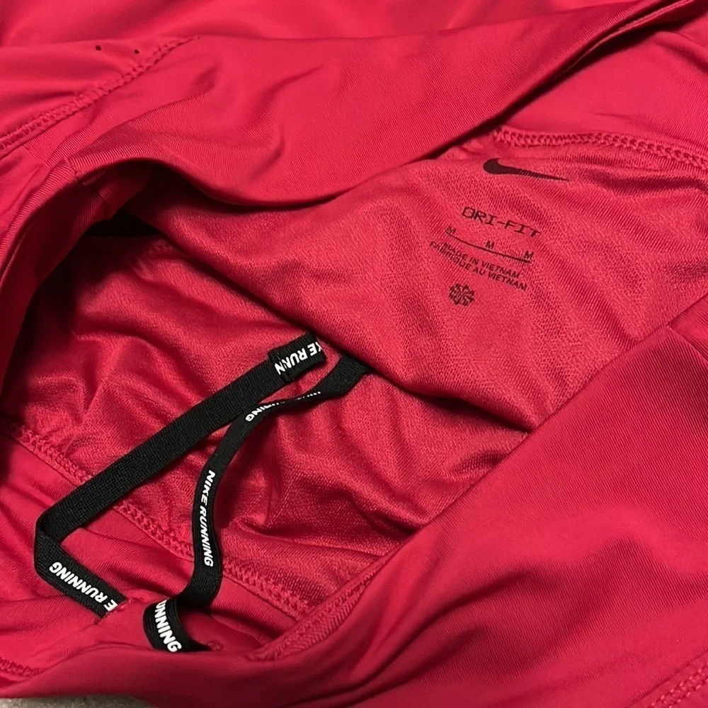 Nike raspberry colored Dri-Fit running shorts, medium, new